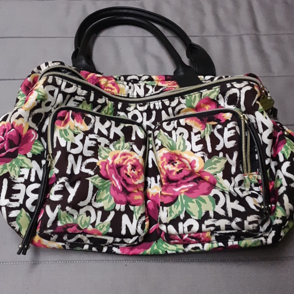 Betseyjohnson purse never used multicolor flowered